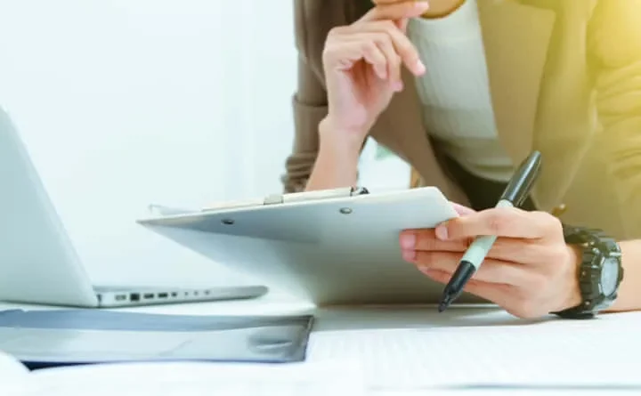 HR department processing new employee registration documents.